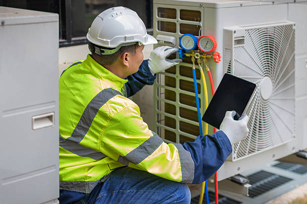 Professional Heat Pump Repair technician working in Newport, NC